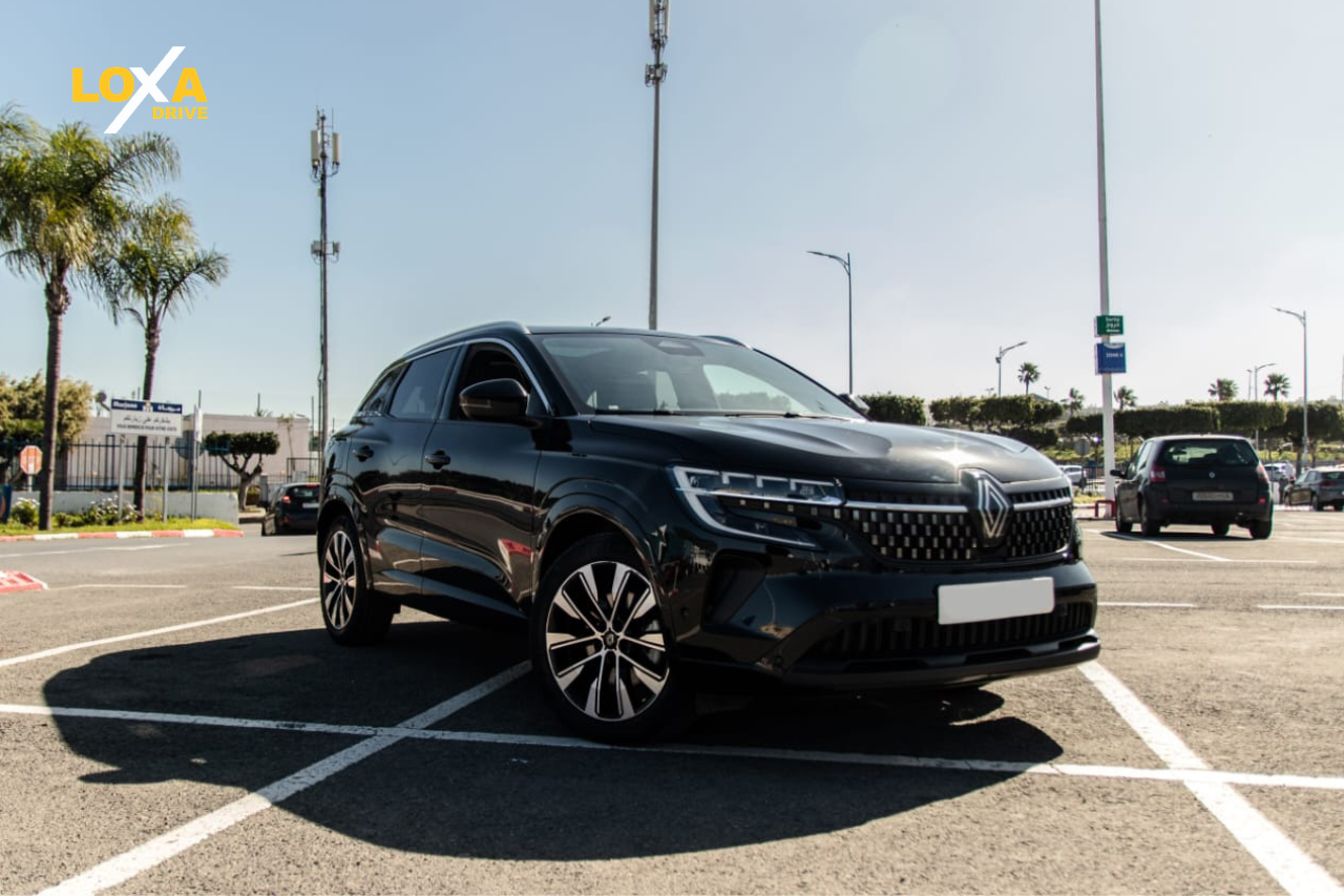 Marrakech airport car rental pickup at Marrakesh Menara Airport with customer collecting keys
