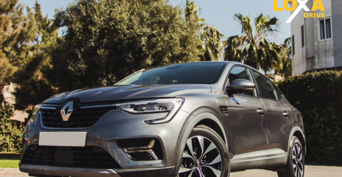 Car rental pickup at Marrakesh Menara Airport with customer collecting keys upon arrival