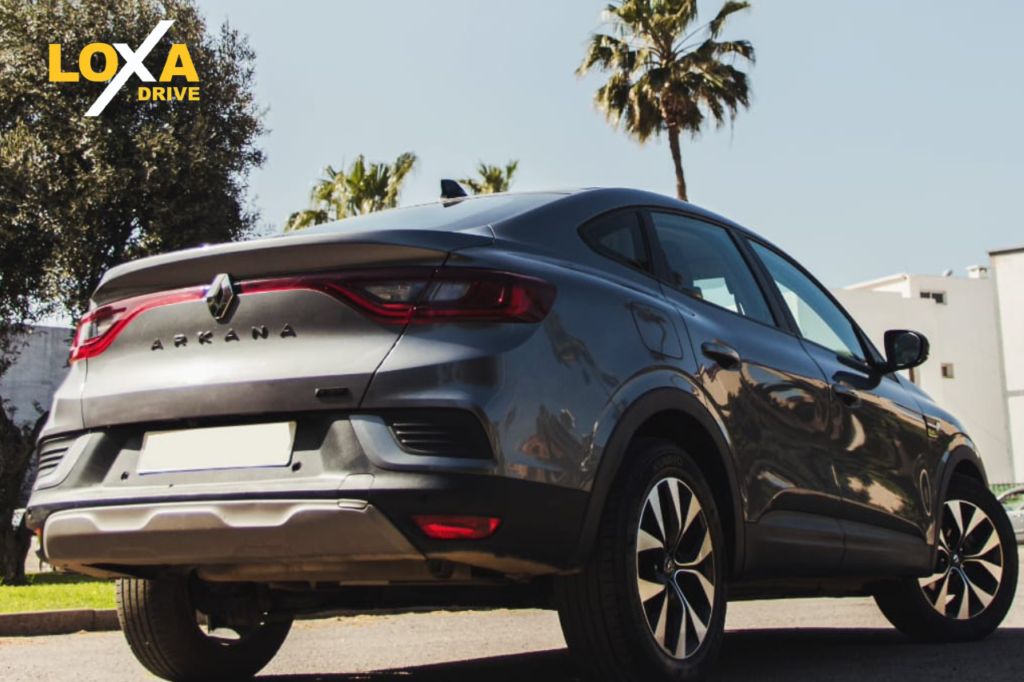 SUV rental at Marrakech Airport parked outside arrivals terminal ready for immediate pickup